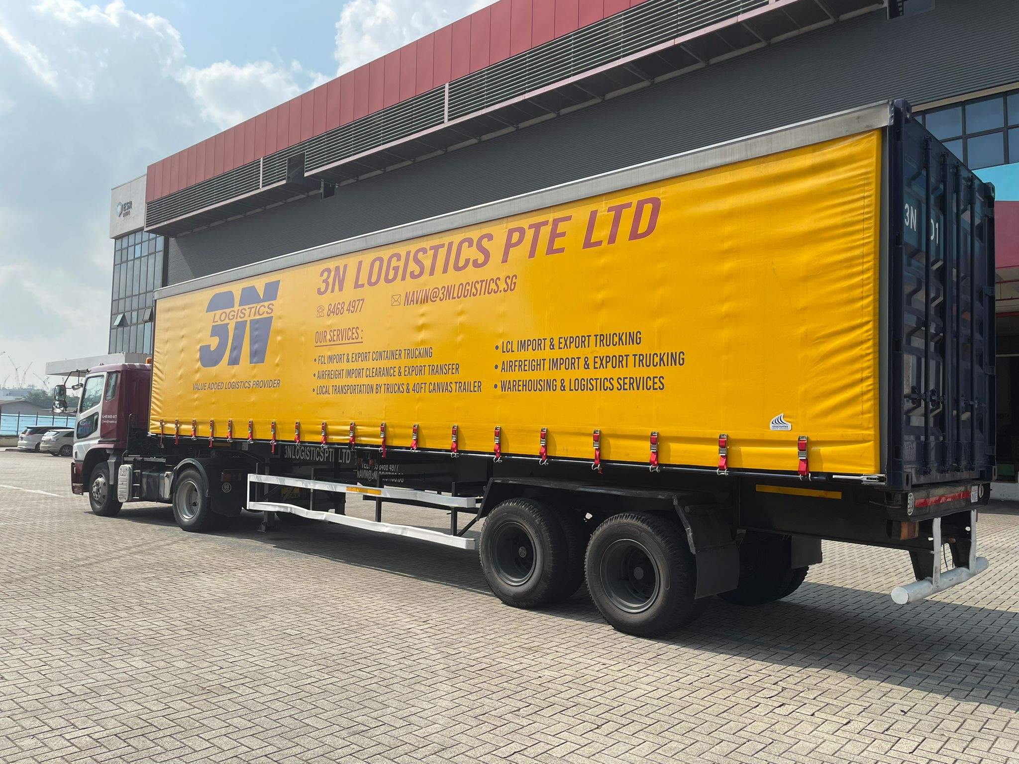 3N Logistics canvas trailer rear view at port