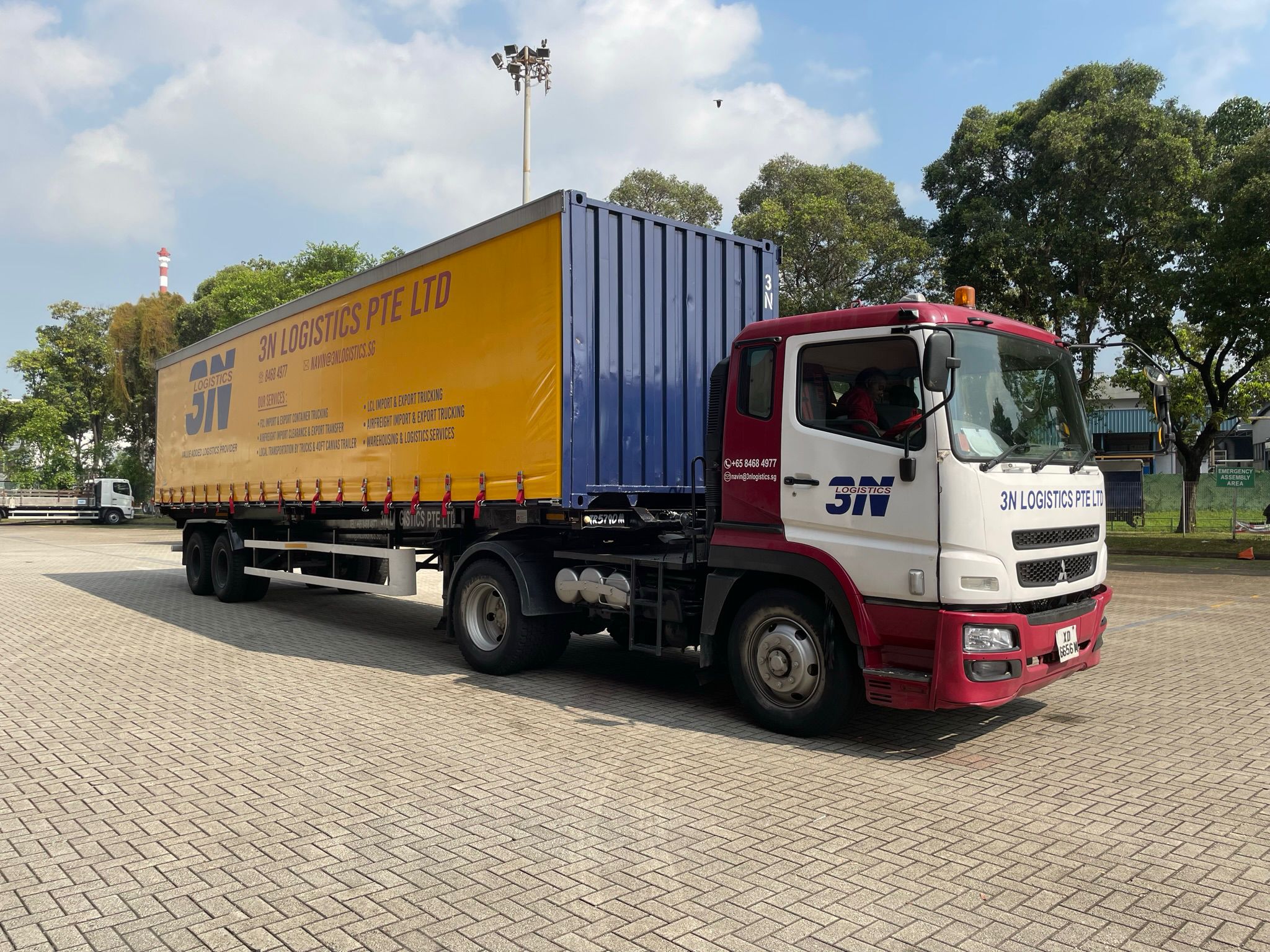 3N Logistics canvas truck on sunny road for ground transport